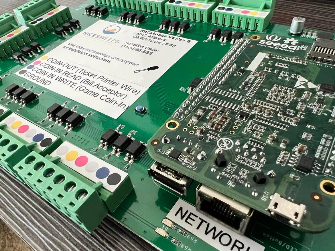 Close-up of a KitCabootle board label showing the wiring color code
